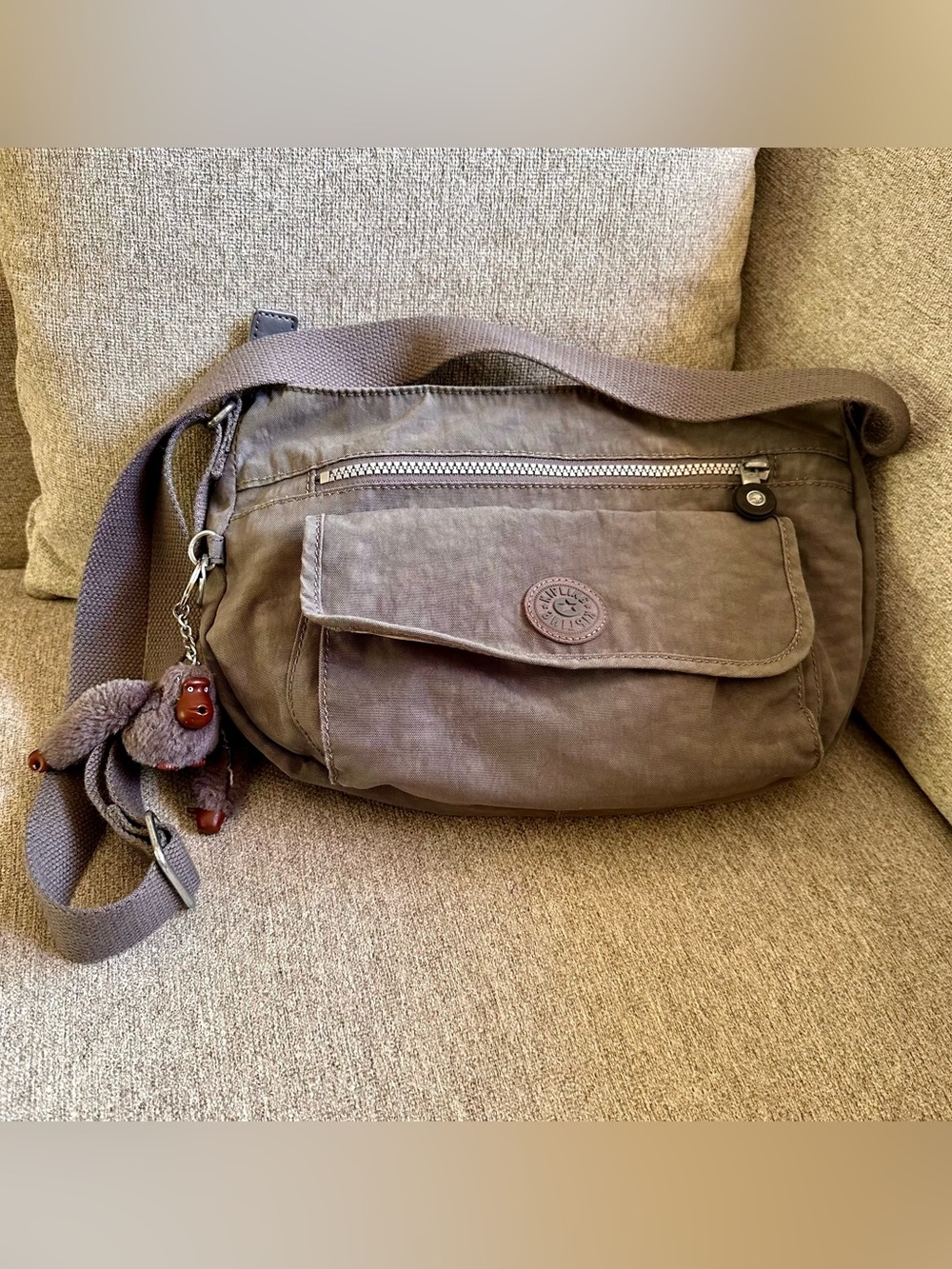 Kipling Crossbody Sling Bag in Taupe with charm